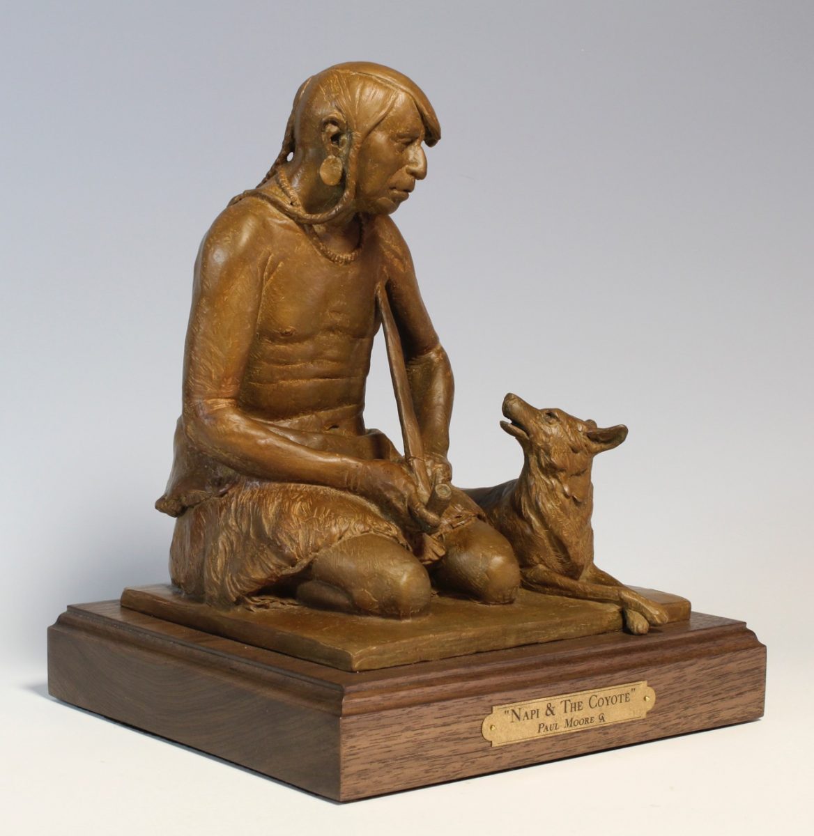 Bronze sculpture of Native American and his dog by Paul Moore