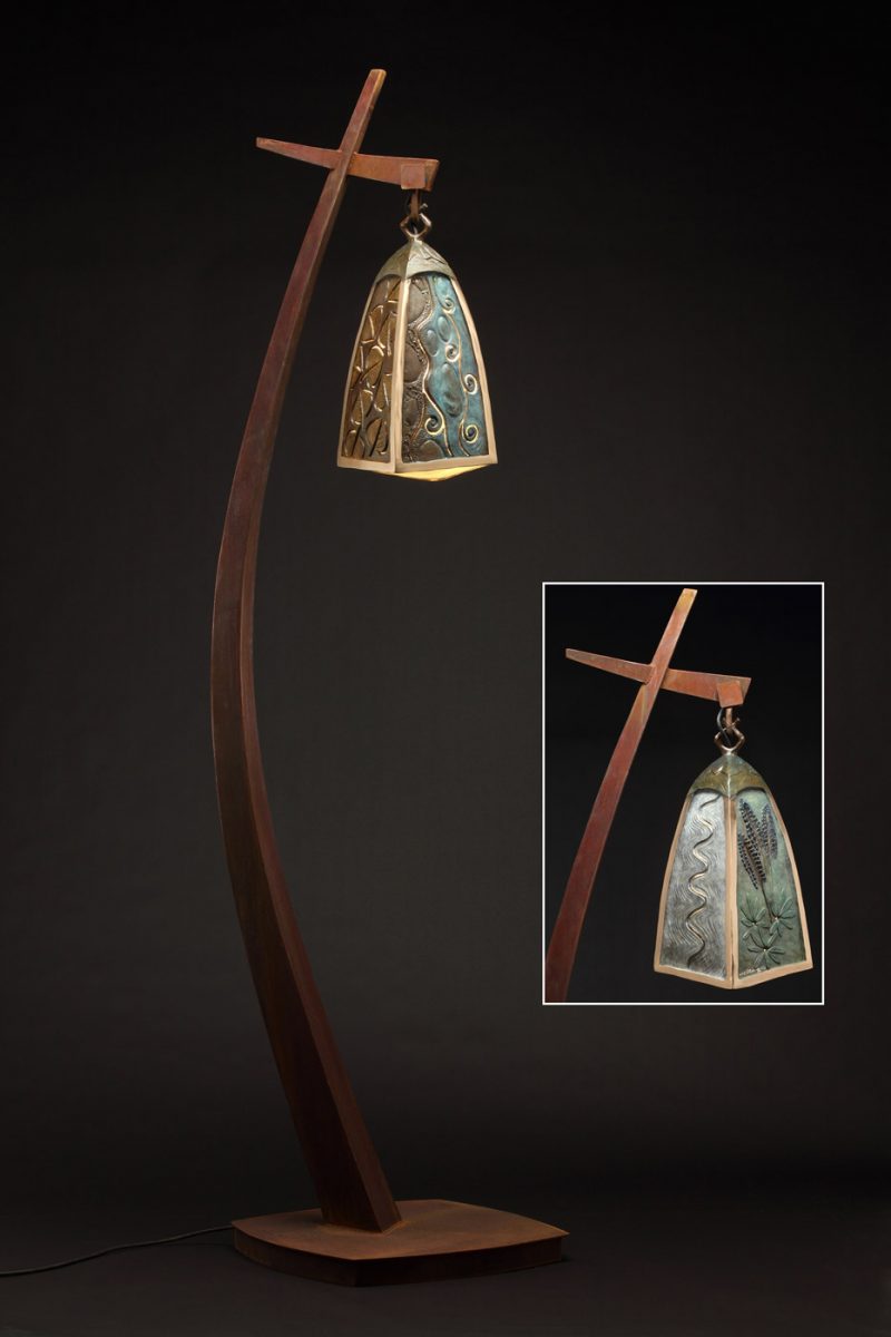 Tall bronze lamp by Colorado artist JG Moore for the city of Vail