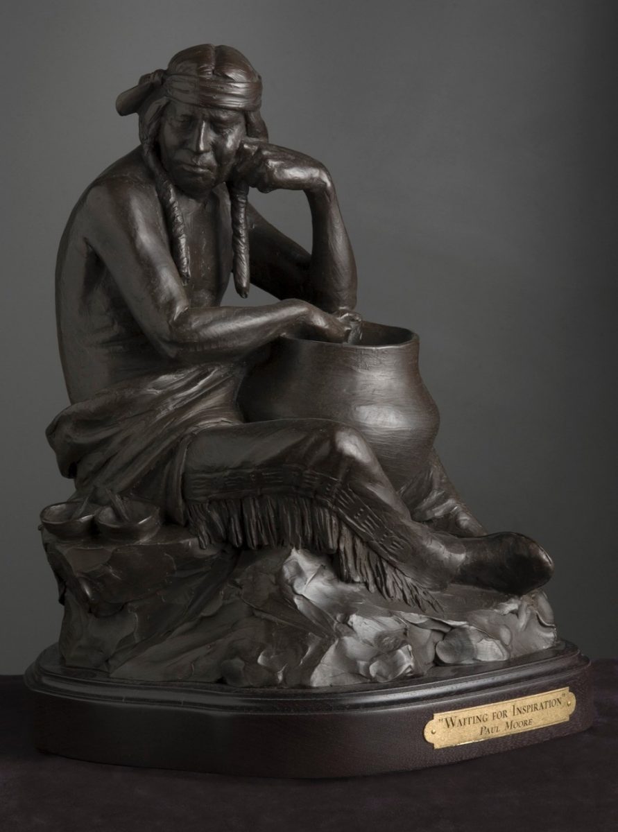 Bronze sculpture of Native American potter by Paul Moore