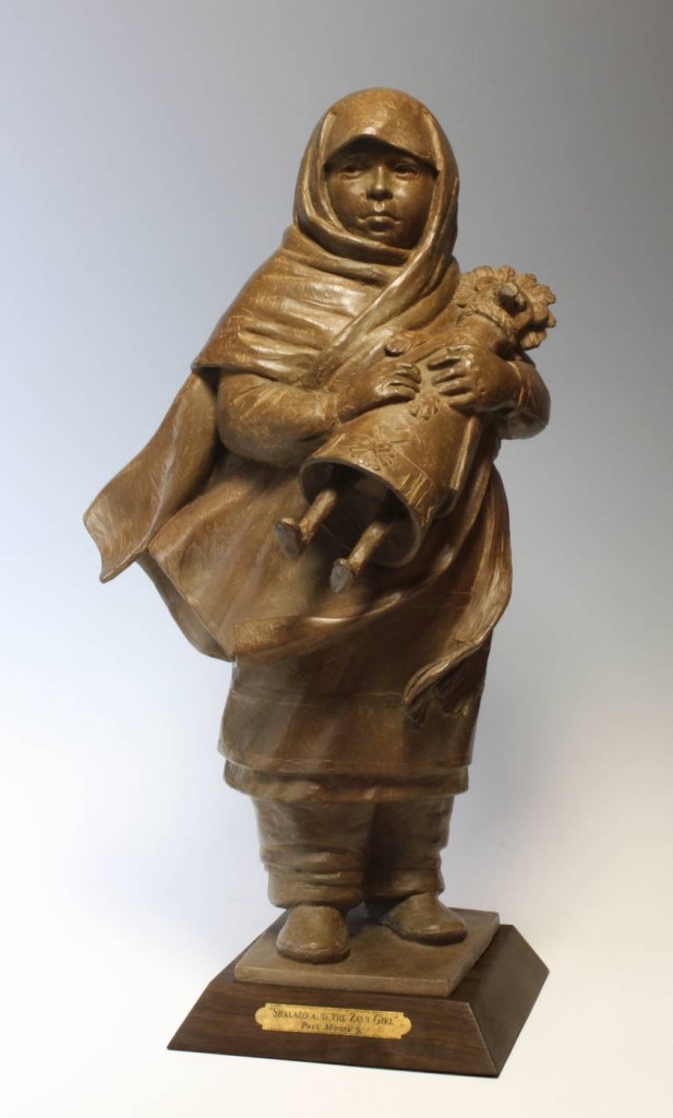Bronze sculpture of Native American Girl with doll by Paul Moore
