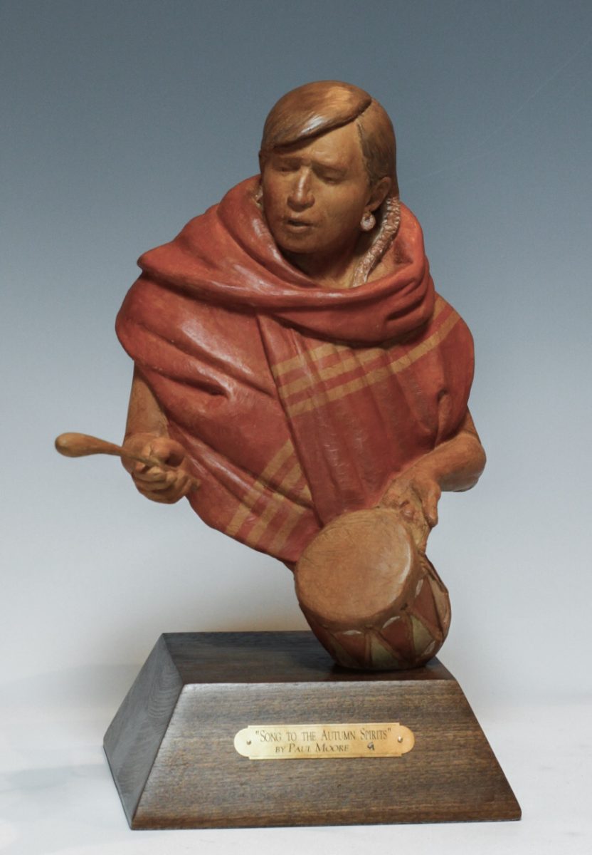 Bronze sculpture of Native American drummer by Paul Moore